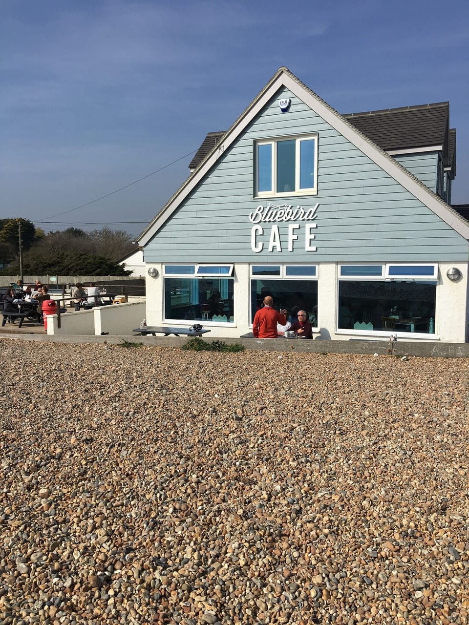 Bluebird cafe - 5 min walk along the beach. Excellent, and dog friendly. 