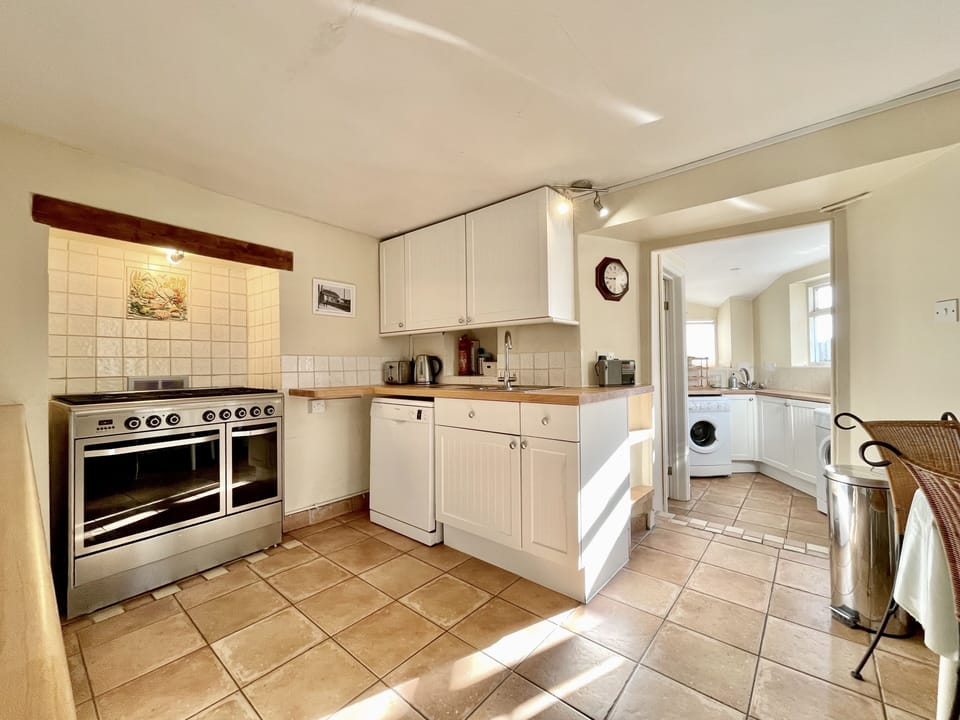 Kitchen through to Utility Room and Shower