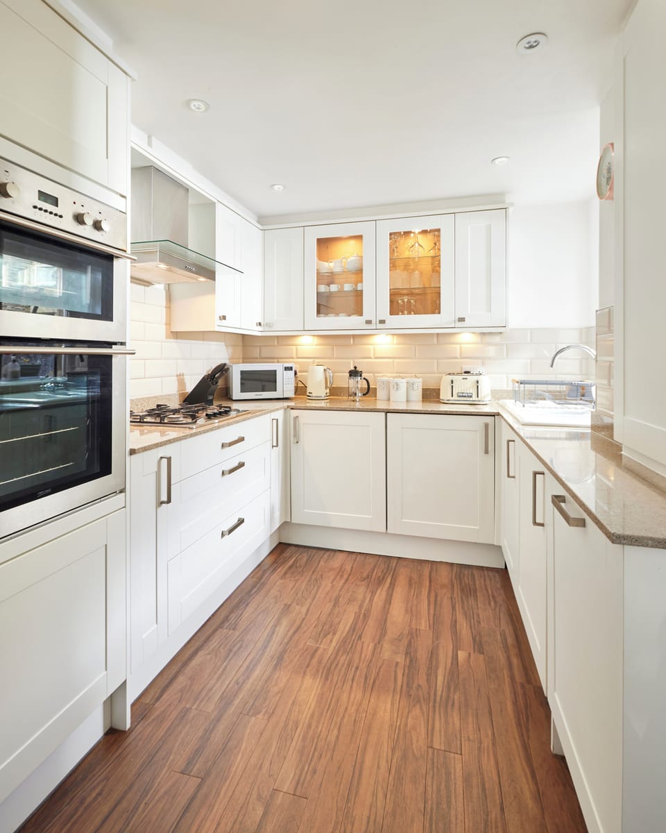 Kitchen with underfloor heating and integrated appliances
