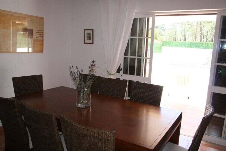 The dining area leads to the terraced patio.