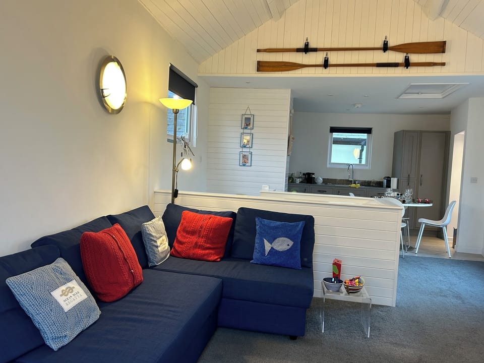 Sofa can convert into a sofa bed. Oars from our rowing boat!