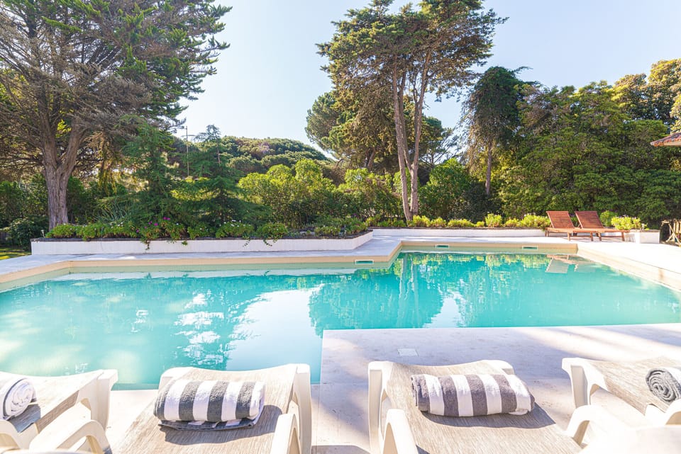 Outdoor leisure space overlooking the pool.