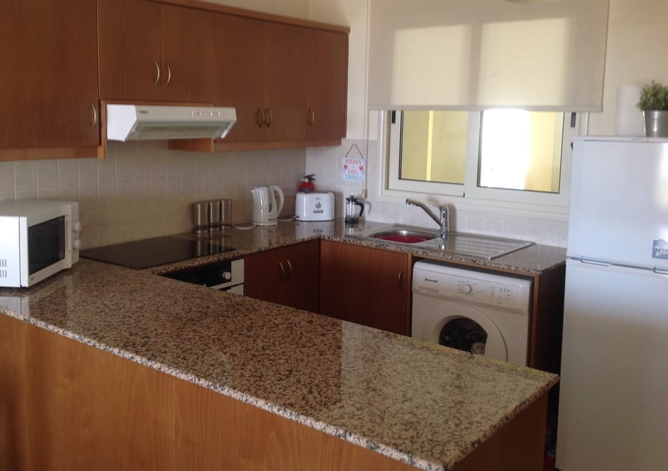 Fitted kitchen with granite work tops