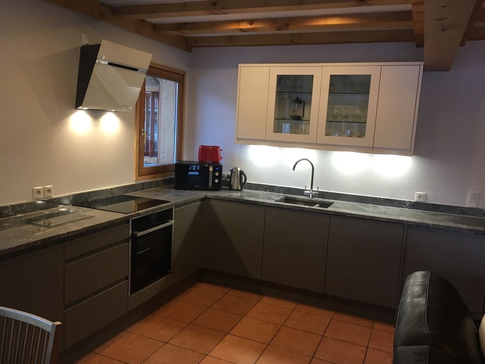 Kitchen with dishwasher, 2 fridges, full cooker and hob