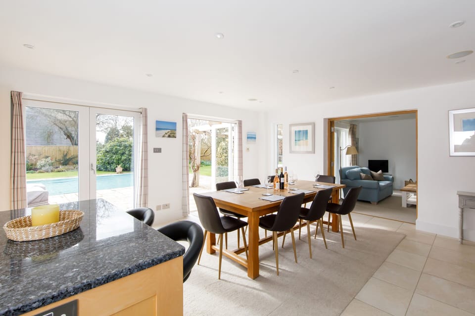 Kitchen/dining room with French windows  to terrace and internal doors to snug