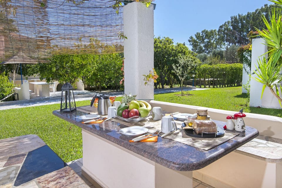 terrace with stoned table with garden view  