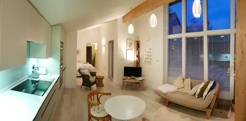 Kitchen and Dining Area through to the Bedroom