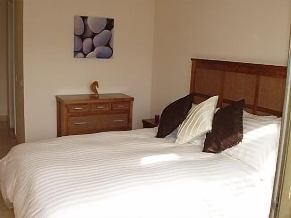 Ensuite Bedroom with View over the swimming pool