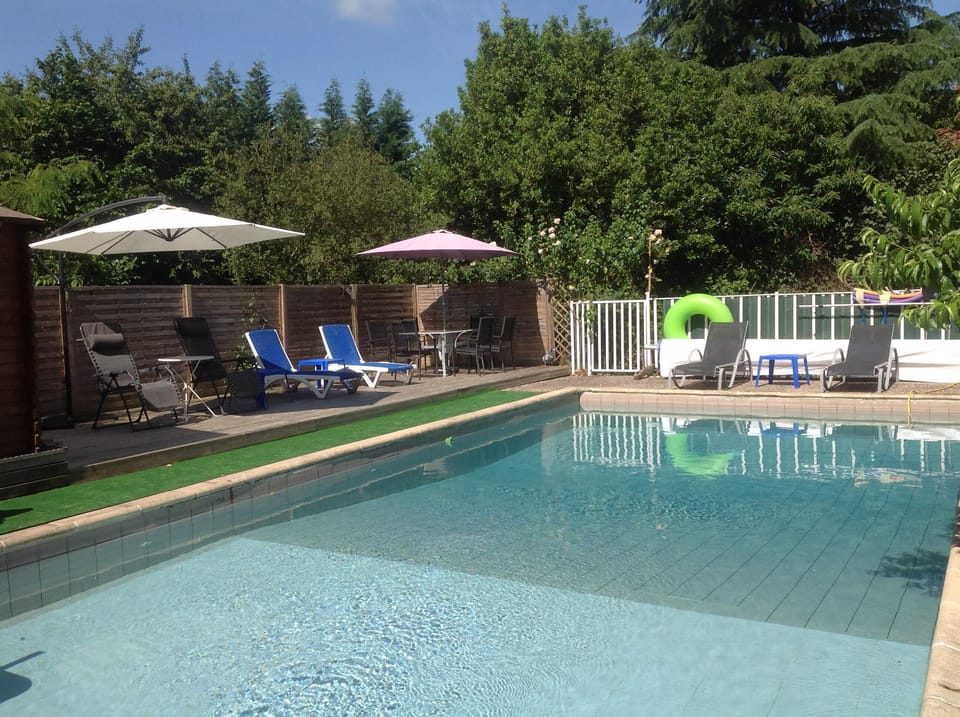 10x5 metre heated pool (2.3 metre deep far end) with umbrellas ands sun loungers