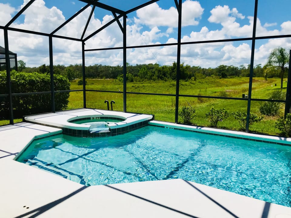 Pool and spa overlooking Wetlands