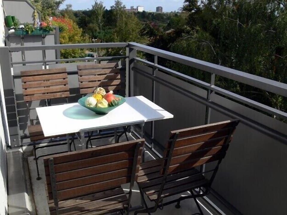 Balcony with view of greenery