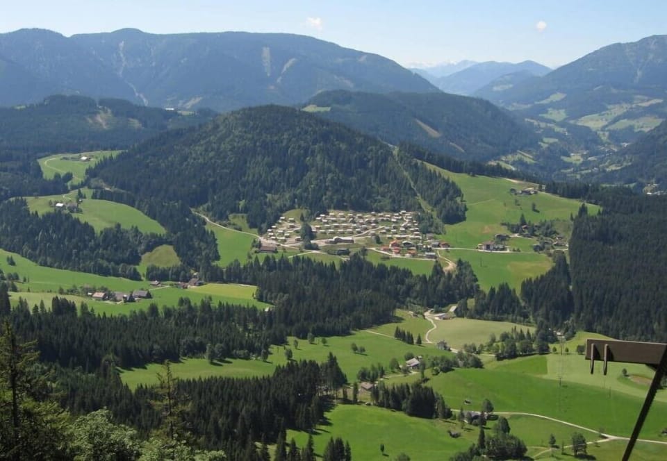The Alpendorf surrounded by emerald green hills. Enjoy big breaths of fresh air!