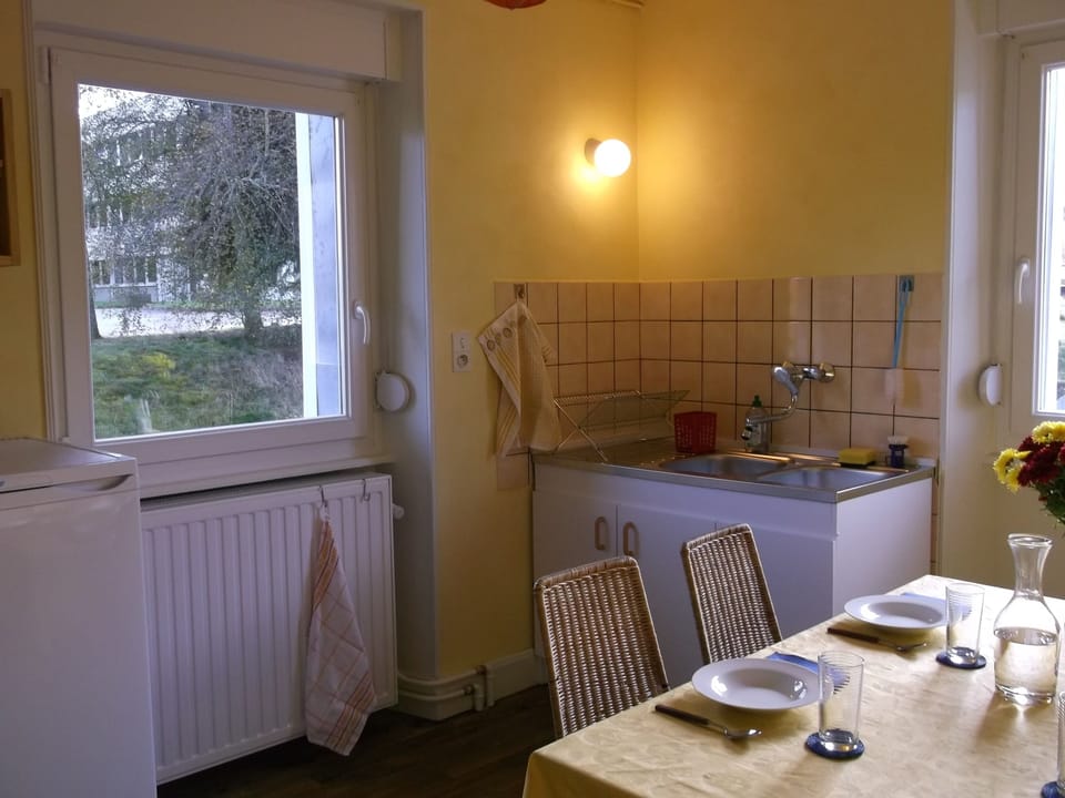 Kitchen, sink and window to the east, in the evening
