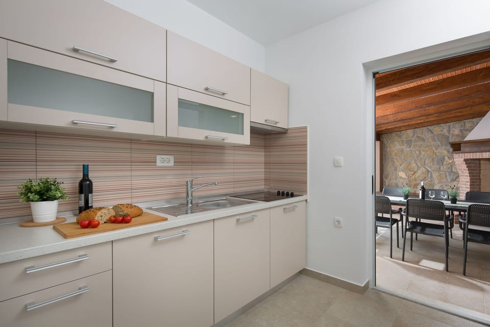 The kitchen on the ground floor with a large dining table