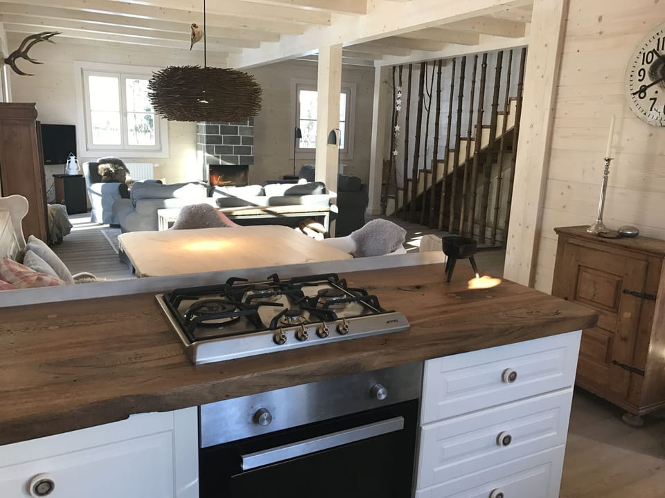 Full view kitchen/dining table/living room