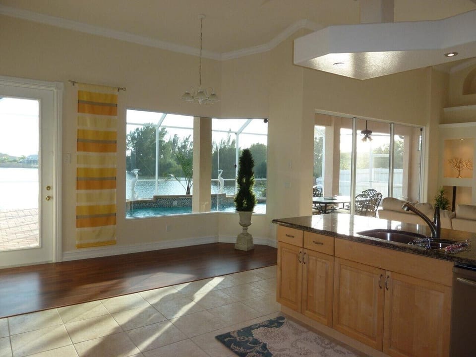 View of pool and lake from the kitchen