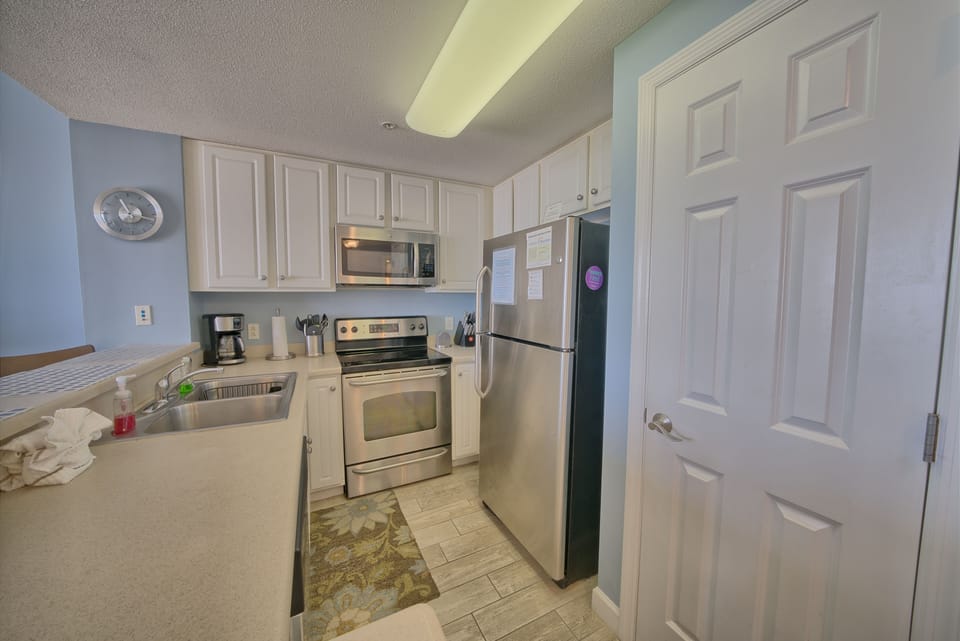 Everything you need.  oven, microwave, fridge and dishwasher!