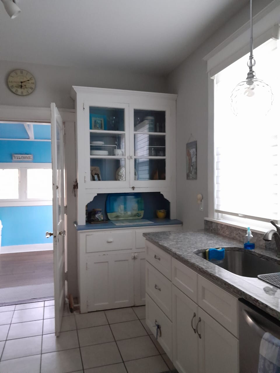 Vintage kitchen cupboard; looking out to back dining area