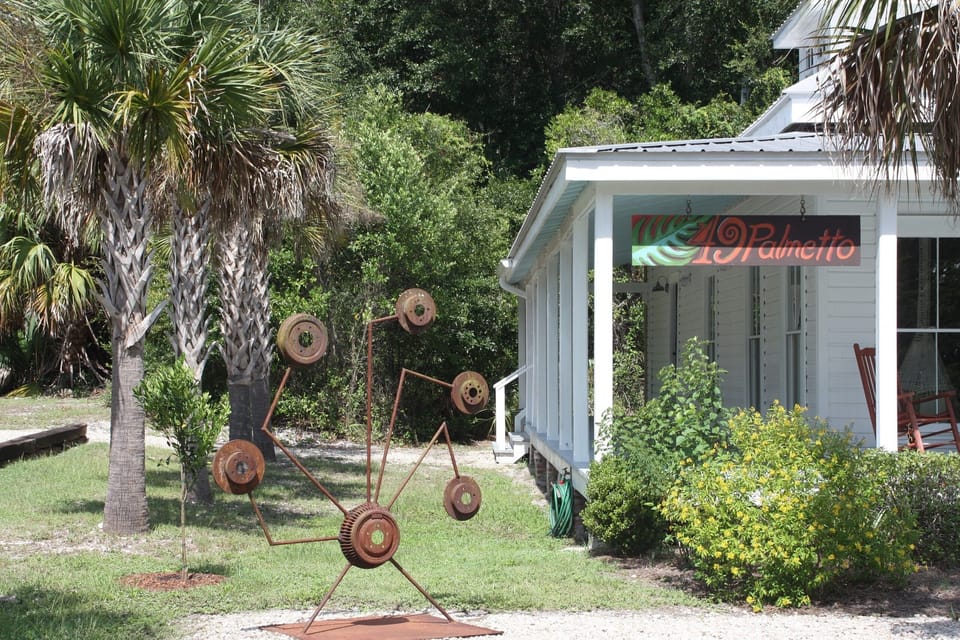 Side porches at 49 Palmetto--catch the shade and a breeze--its always nice.