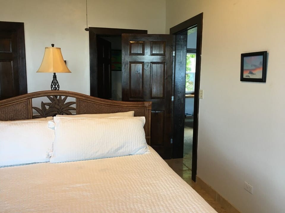 King sized bed in both downstairs Main Suites. View of Sunrise Main bedroom.