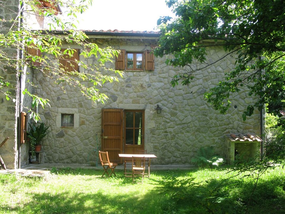 Back of the house with private seating/dining area
