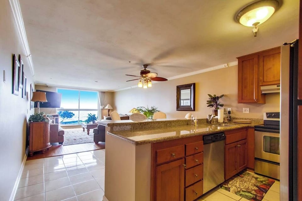 Open style floor plan with California-style kitchen and oceanview