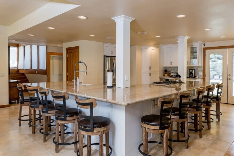 When a kitchen has bar seating for 10, you know it is big