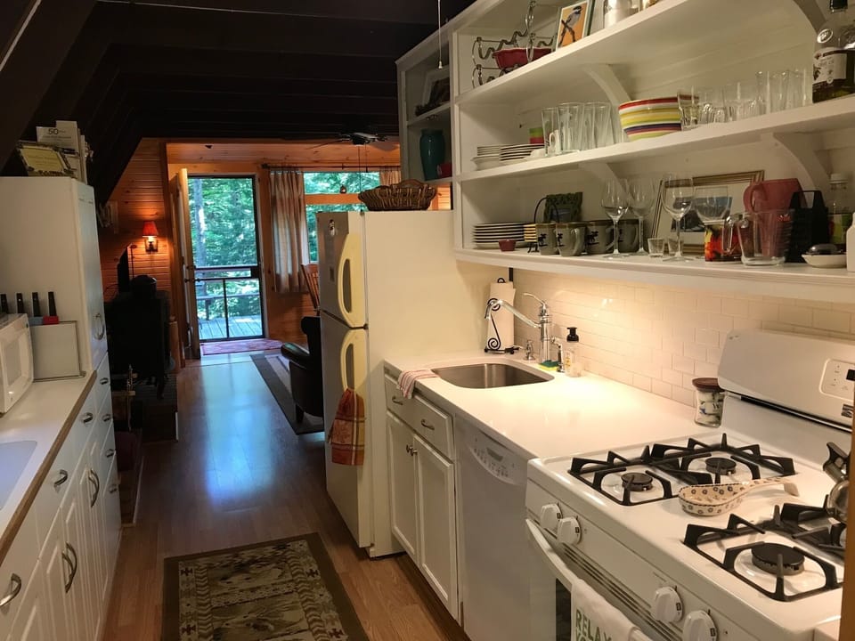 The Galley style kitchen has everything you want and enough room to make a great