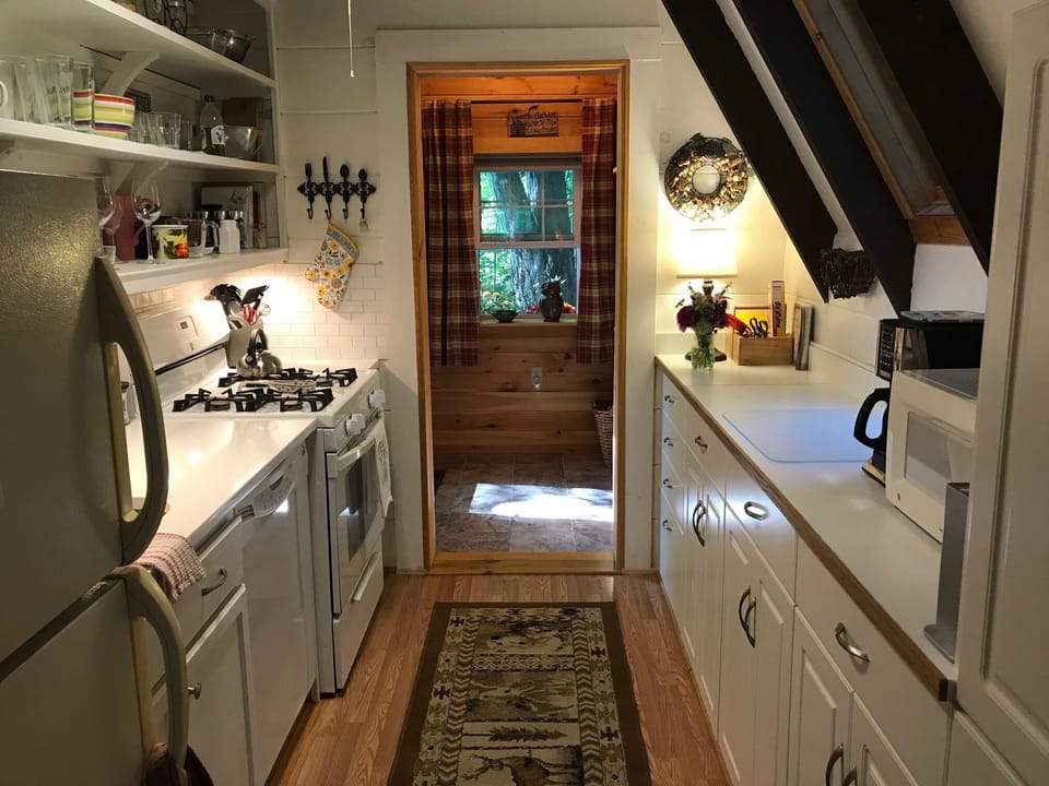 The kitchen view as you look back towards the front entry.