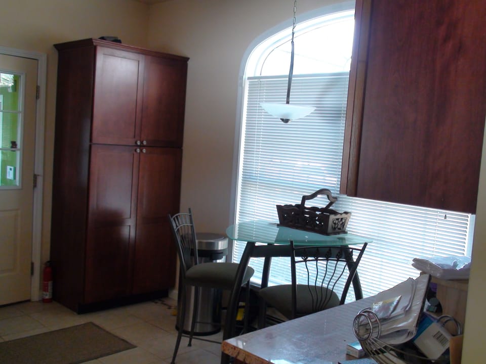 Kitchen with view to front lawn and driveway from road entrance