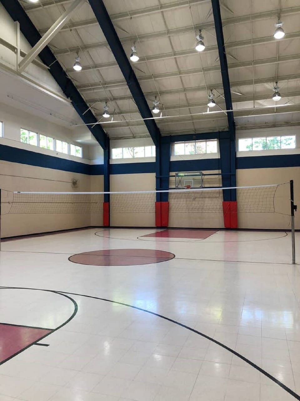Building amenities include and indoor basketball and volleyball court
