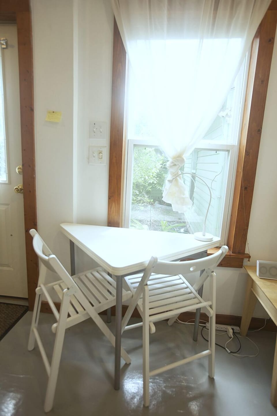 The furniture in the Studio is convertible. This table folds out to seat 4.