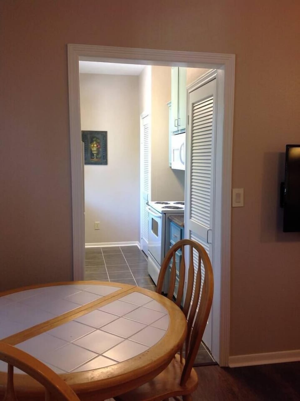 Dining table sea ts 6.  Just ask owners if more chairs needed.