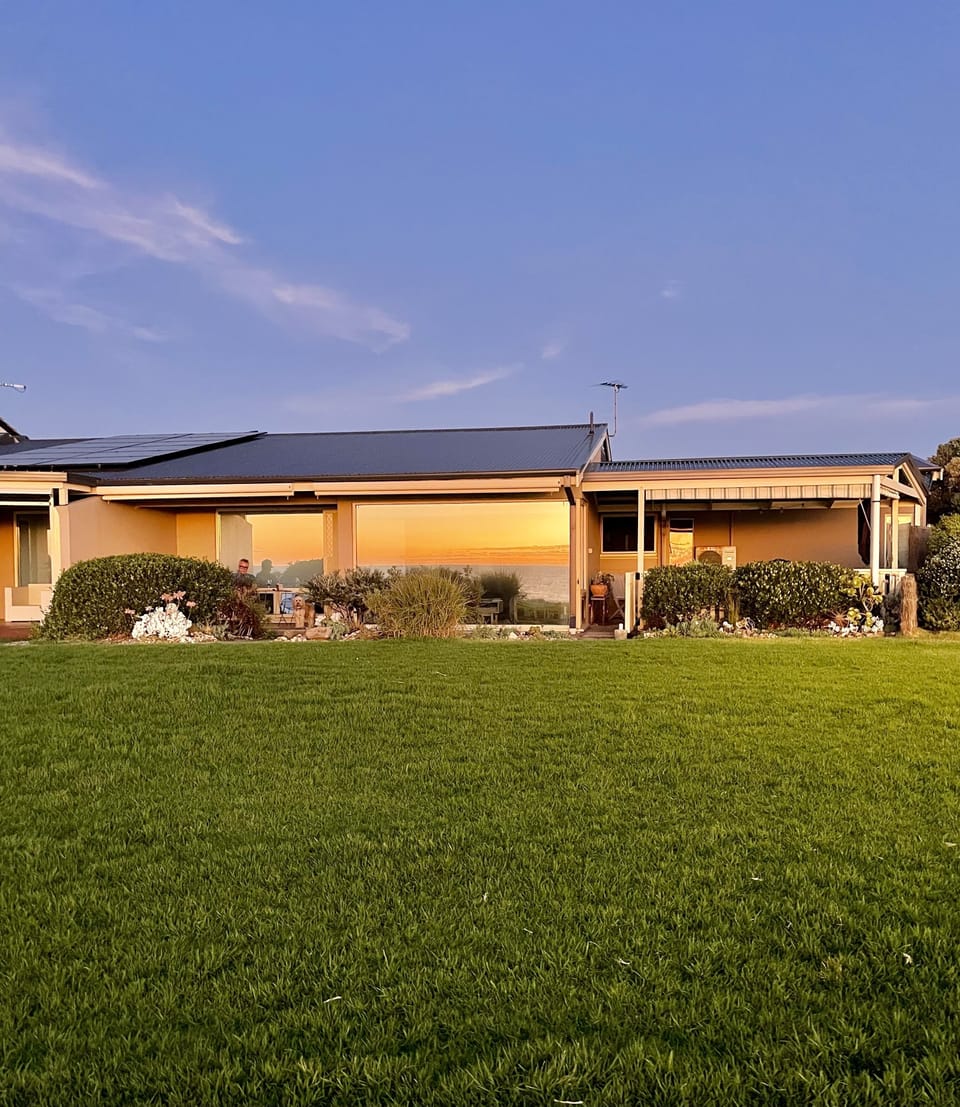 Our house is lit up at sunset time!