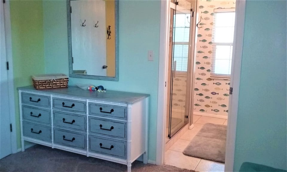 Master bedroom/ bathroom. Large 9 drawer dresser.