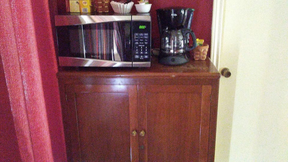Microwave And Coffee Maker With Complimentary Coffee And Teas