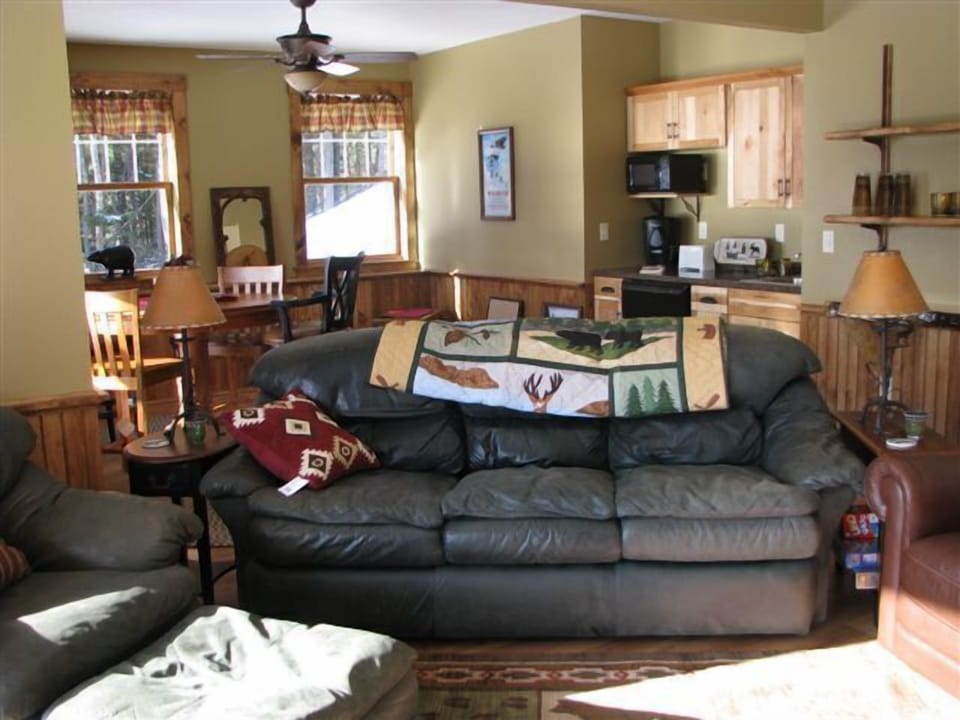 Family room downstairs with wet bar, conversion poker table, and games/puzzles 
