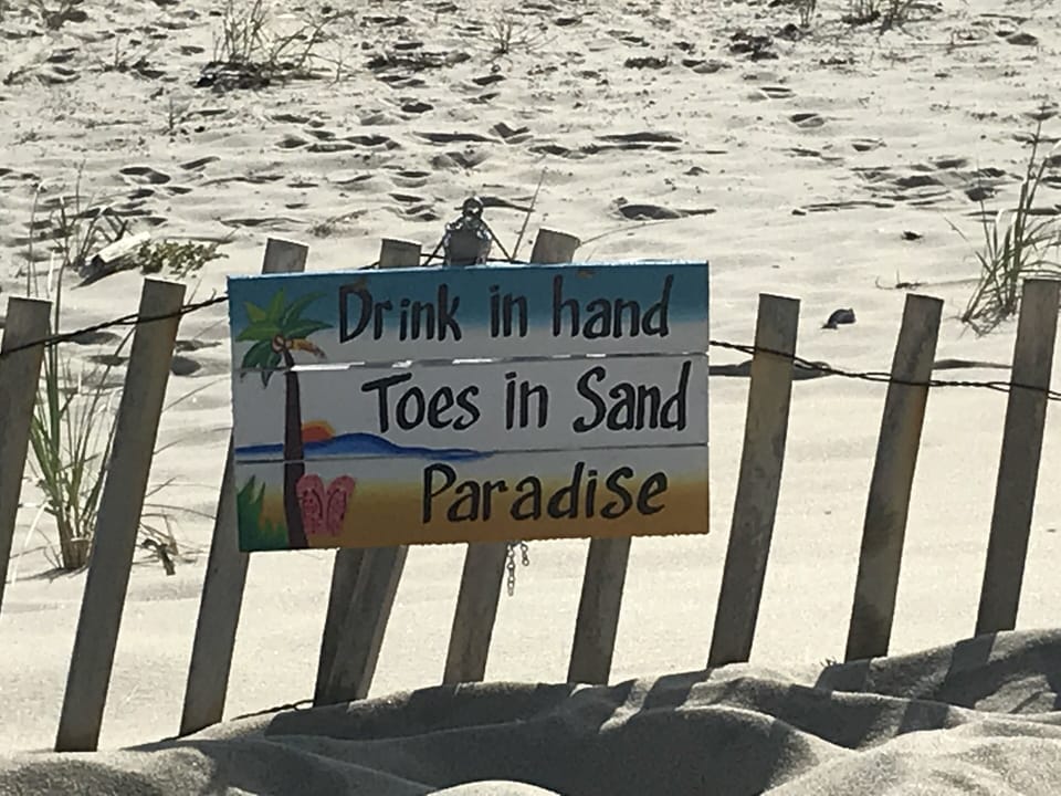 Sign at "Beach Club" says it all.