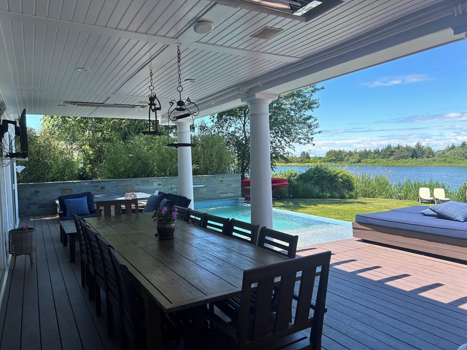 Outdoor dining for 12 with ceiling heater. 
