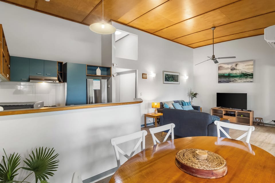 Main living space. High ceilings, view from dining window.