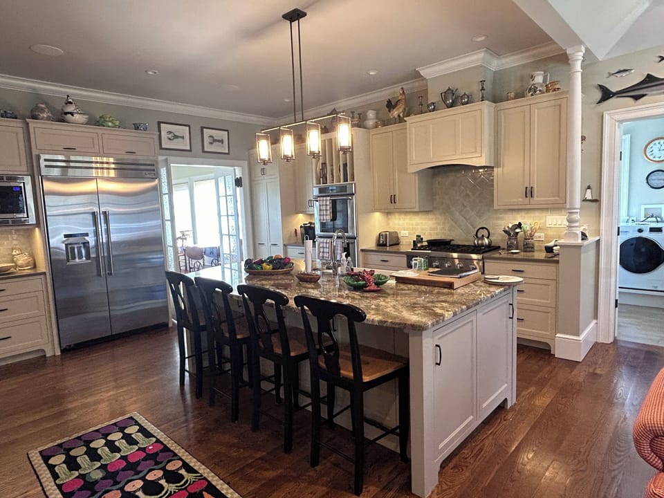 Well equipped kitchen, laundry room adjoins