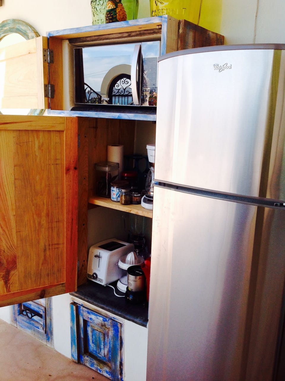 Microwave, small appliances, assorted tea, spices & condiments