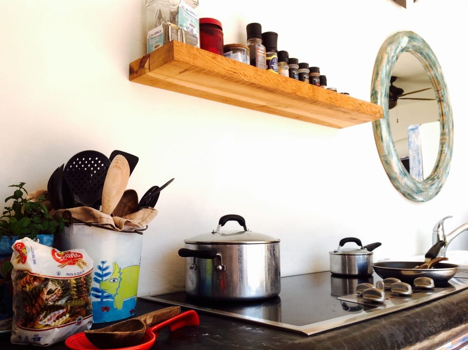 5 burner ceramic cooktop with all the necessary cooking tools & cookware. 
