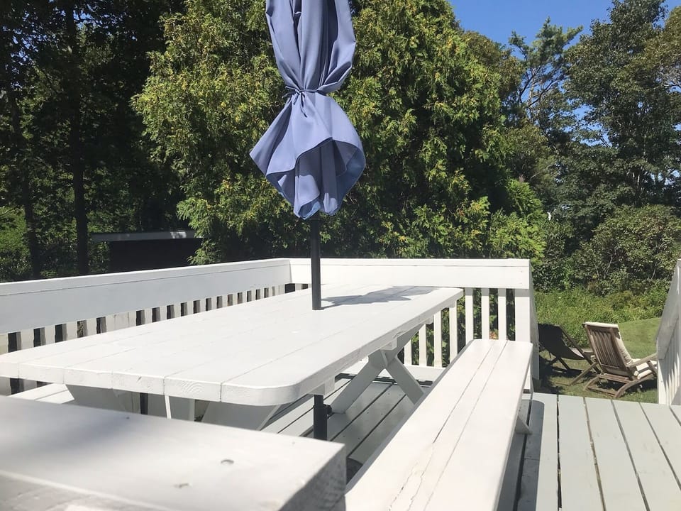 Dining deck overlooks the garden