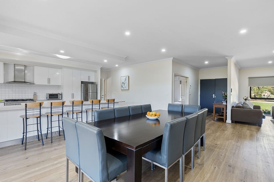 Huge dining Table and top grain leather chairs x 12  for big groups