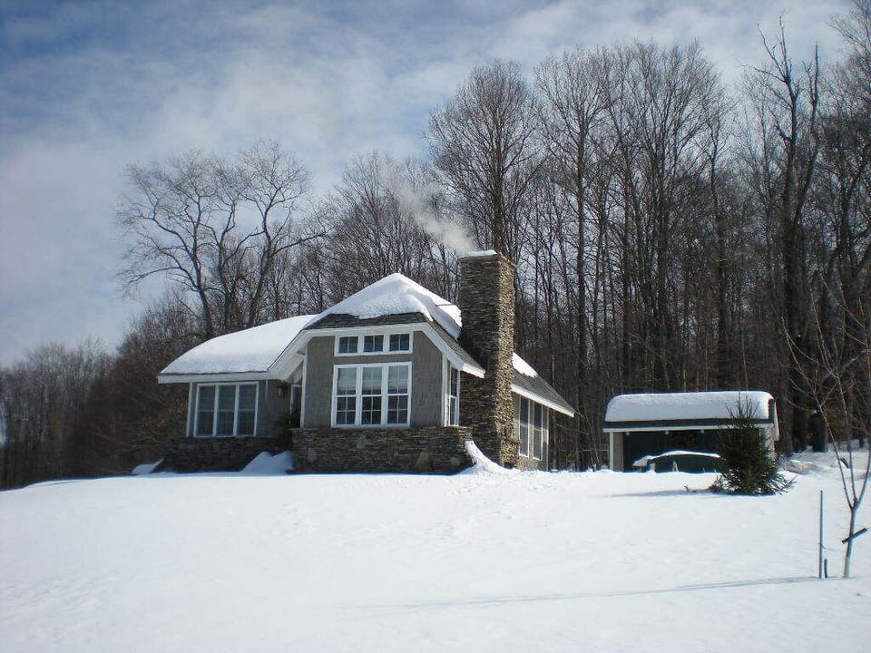 Woodstove and all seasoned firewood are provided