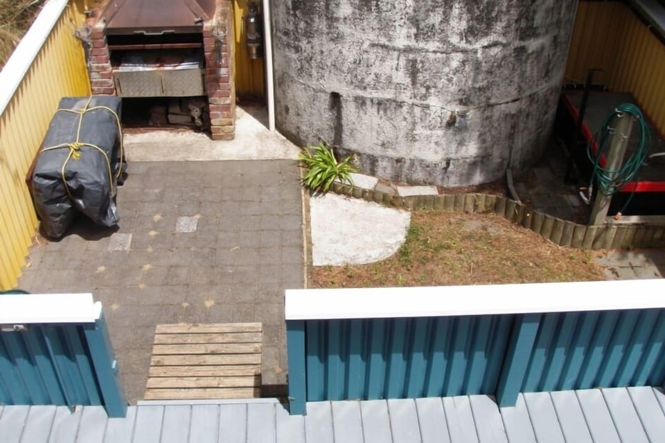 Rear BBQ and pizza oven area