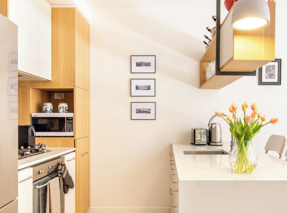 Kitchen fully equipped with appliances and mod cons