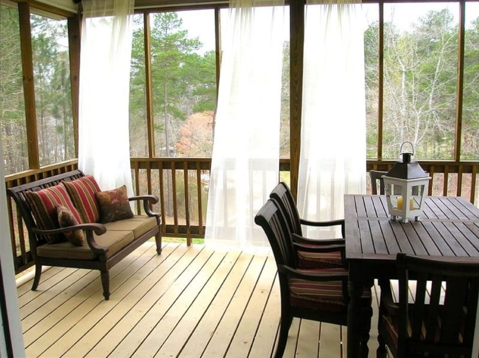 Enjoying a cup of coffee or an evening dinner, this porch is a favorite spot.