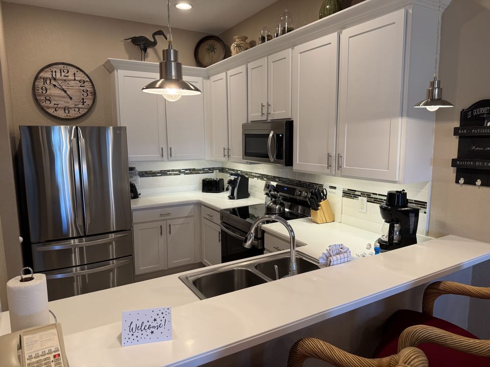 Our fully-equipped kitchen includes fridge, stove, dishwasher and microwave.